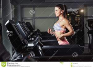 fitness-girl-running-gym-young-sporty-woman-run-machine-41675458